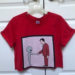 RED AND PINK ALIEN AND MAN GRAPHIC TEE